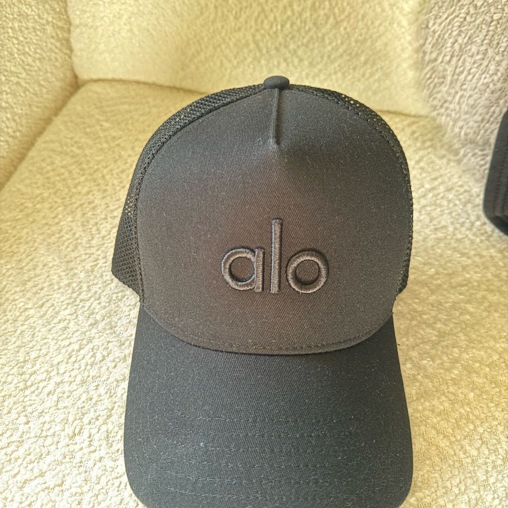 ALO Black Trucker Cap